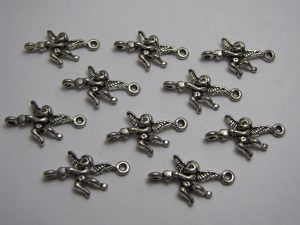 10 Silver metal cherub charms